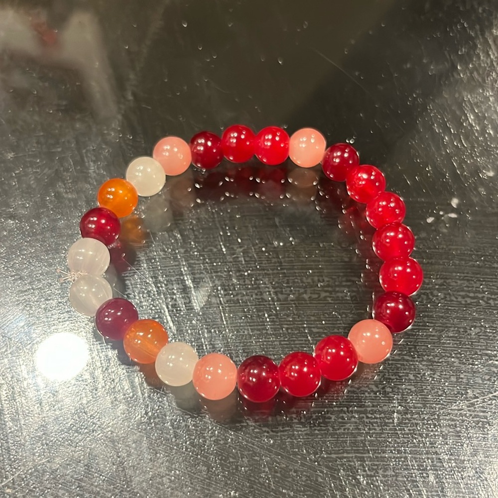 Hand made rainbow beaded bracelets